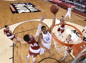 Kentucky and Wisconsin battle it out for a win in the NCAA Final Four game of 2015’s March Madness. PHOTO/Chris Steppig