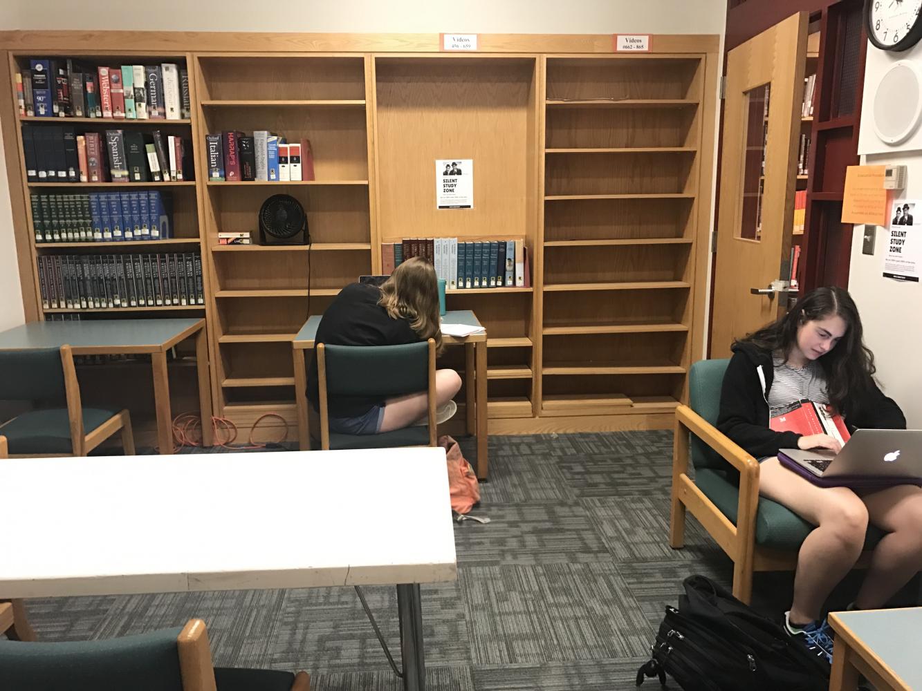 Seniors Sarah Gottbetter and Courtney Burrow working in the silent study room during a free. PHOTO/Danielle Feinstein