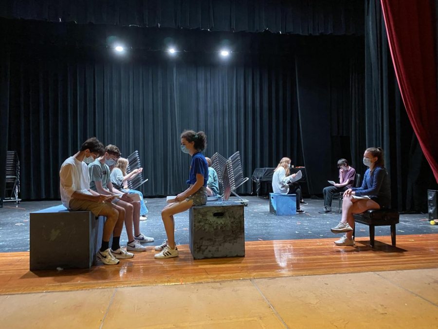 Members of the cast rehearse a scene from “The 39 Steps”
