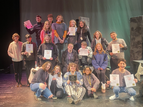 The cast and crew of “The Illusion” pose for a picture with all of their awards.           PHOTO/Anne Isaacs