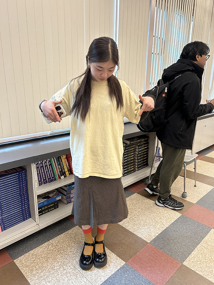Senior Lisa Wang wears maxi skirt  with baggy shirt