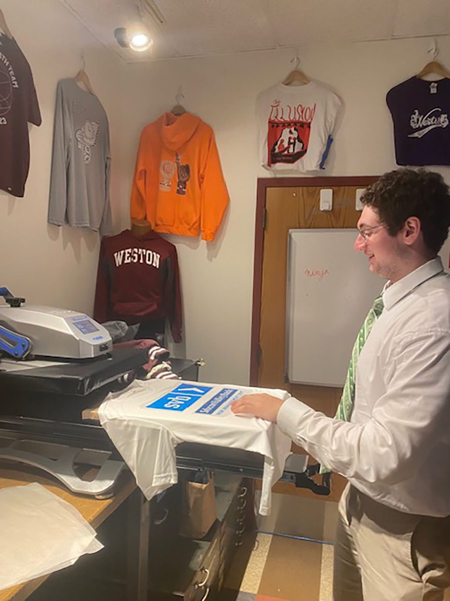 Burd printing t-shirts for the school store 
 