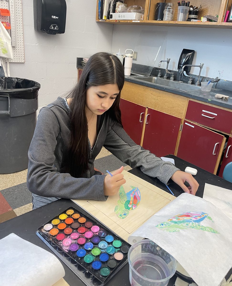 Maya Wong finishes project in Art I class