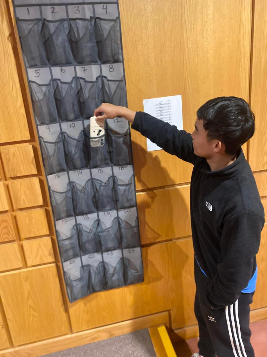 Nathan Zhou using a phone hotel
