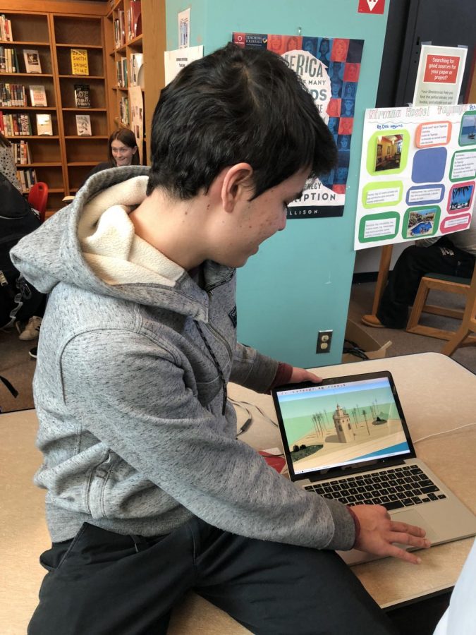 Junior Thomas Speciel displaying  his digital animation to a large crowd. 