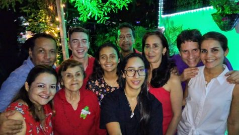 Ben Tremblay poses for a photo with his host family during his trip to Colombia.