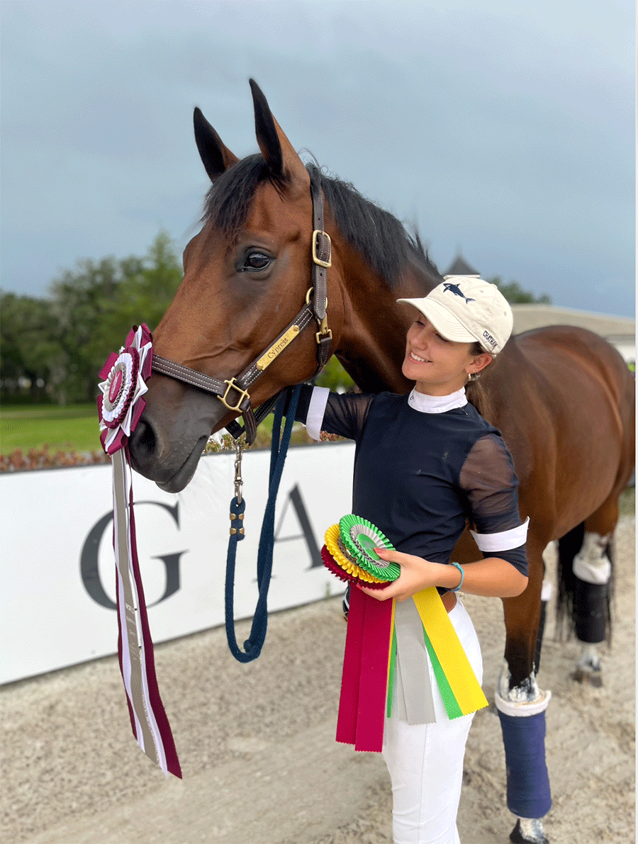 Vivienne Dutot and her horse after a competition