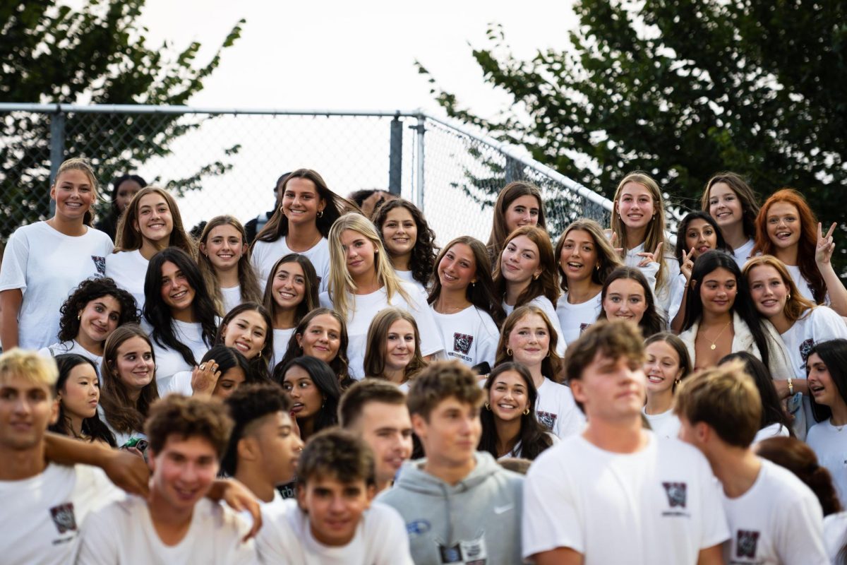 WHS students at the football game before Homecoming