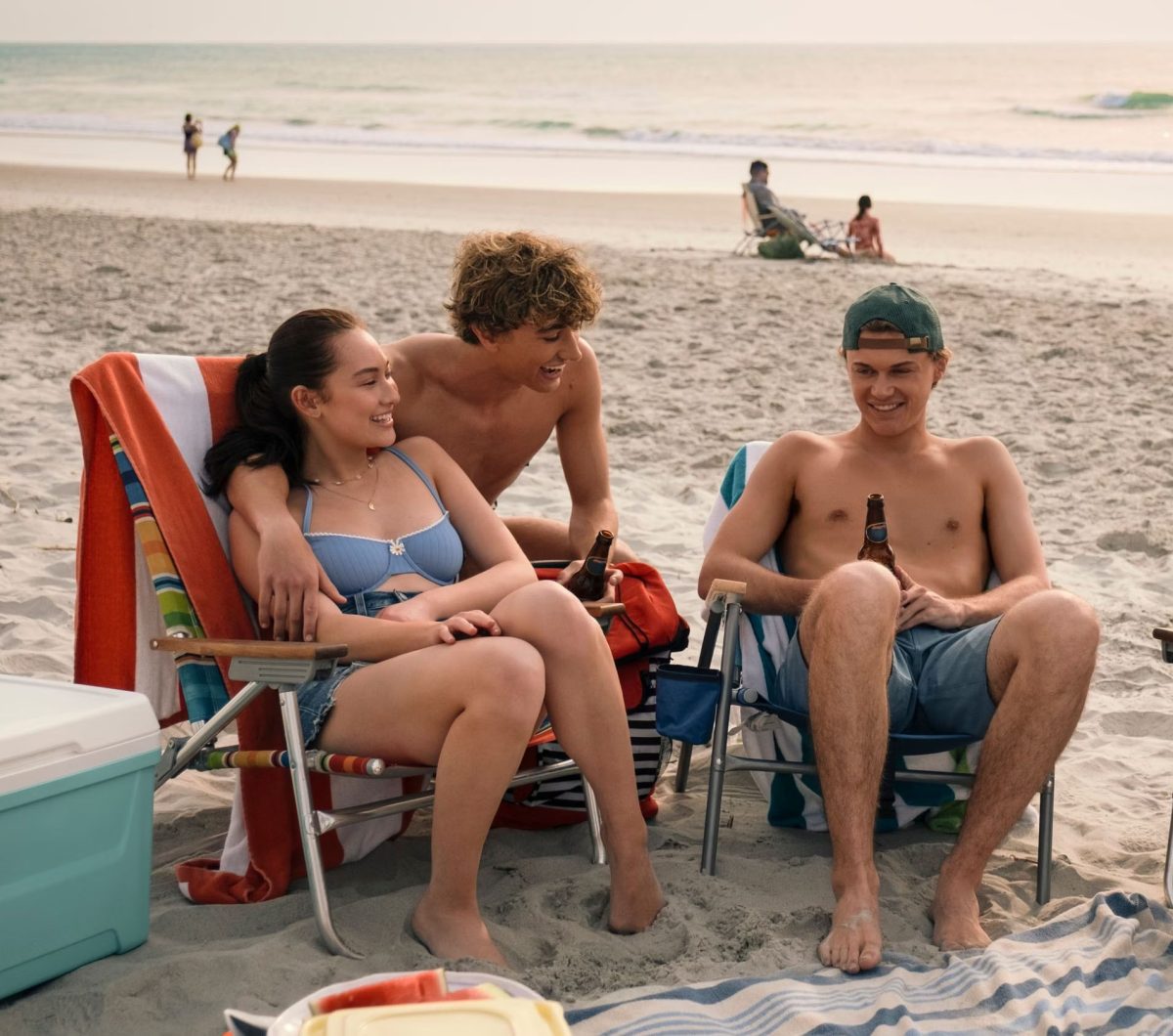 Belly at the beach with the Fisher brothers, Jeremiah (left) and Conrad (right).