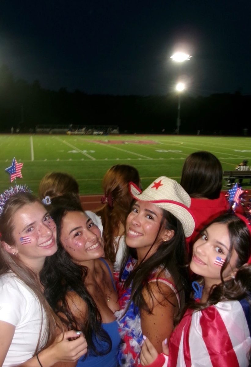 Seniors at USA themed football game